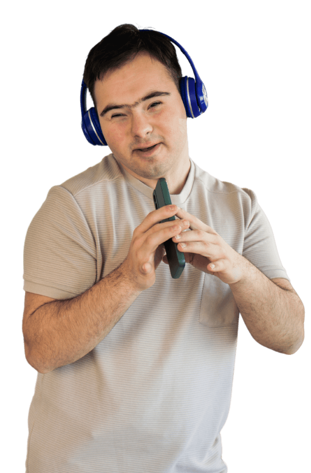 NDIS provider in Perth – young man wearing headphones and holding a device.